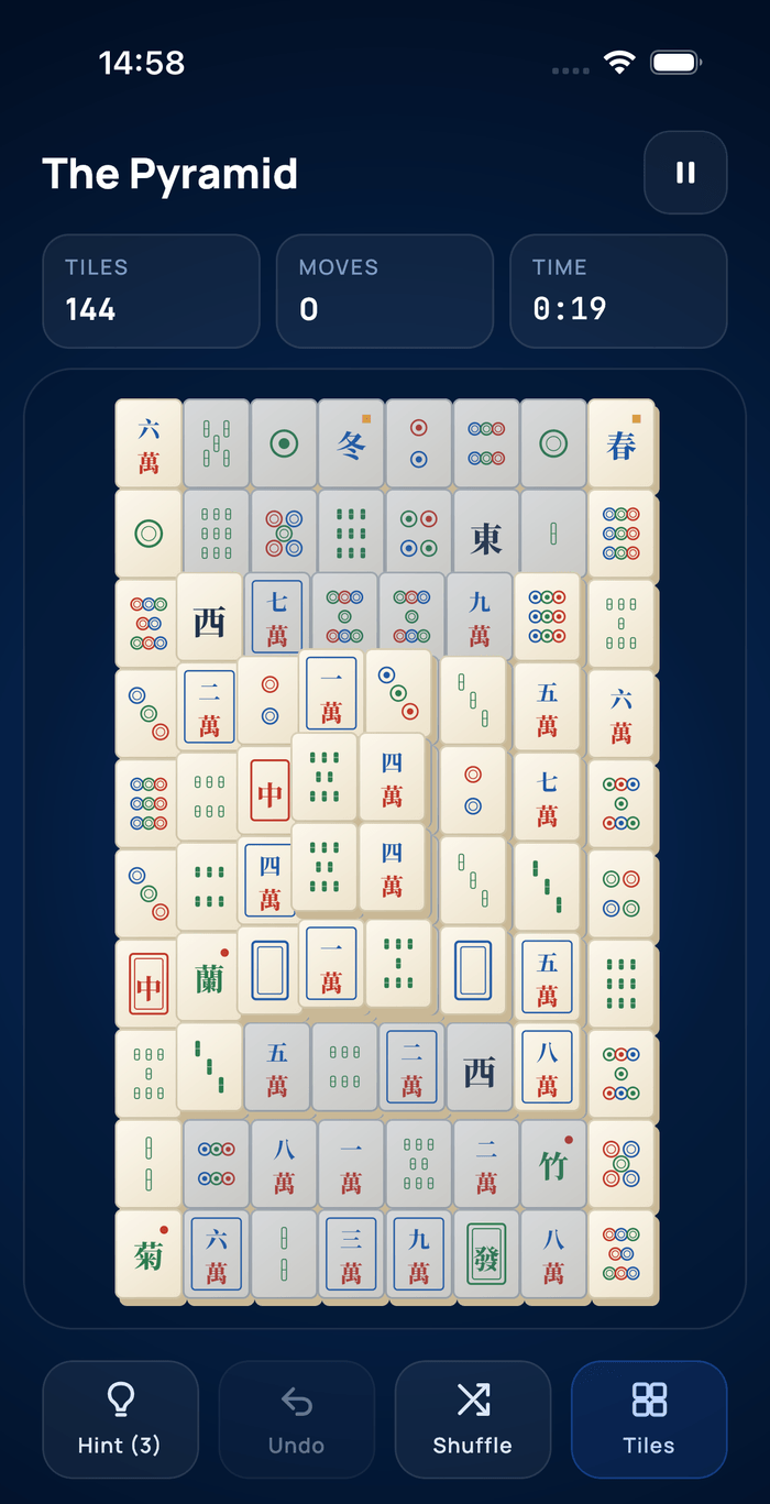 Midnight Mahjong Solitaire's Board screen mid-game: a Pyramid layout dealt with the Ivory Classic tile set, showing the tile grid, TILES/MOVES/TIME stats, and the Hint, Undo, Shuffle, and Tiles buttons